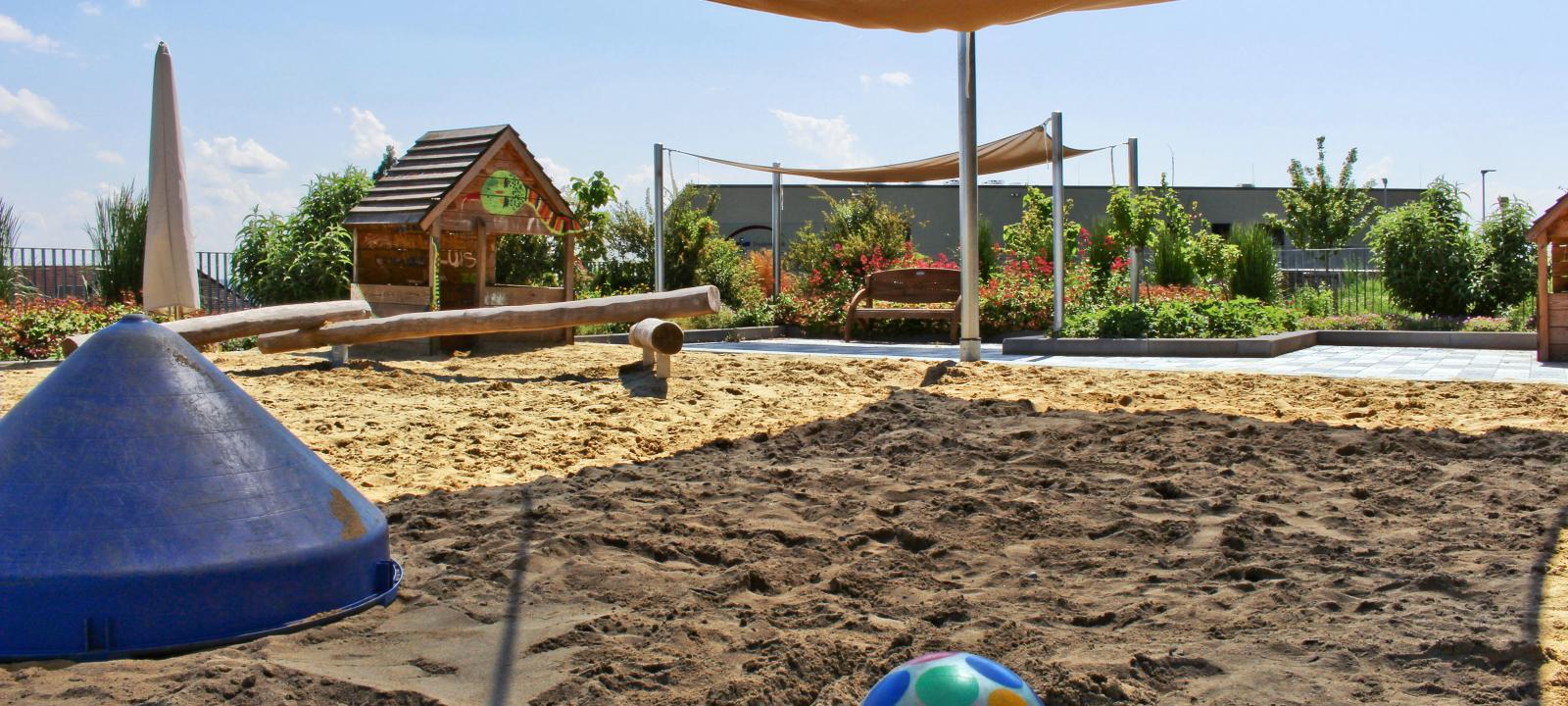 Playground with sand on a roof