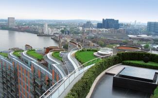 Cascading roof terraces with lawn and swimming pools