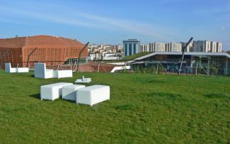 Roof garden with lawn and seats